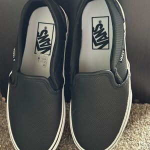 Vans women’s Black Slip-On Shoes